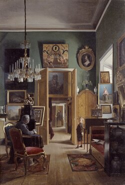 Historischer Salon mit reich verzierter Stuckdecke in Stuckatörens våning